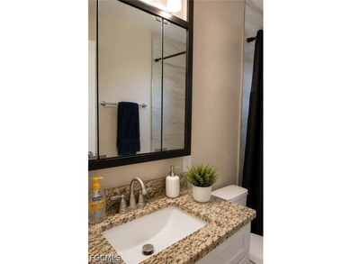Beautifully maintained duplex featuring SHARED POOL two spacious - photo 20