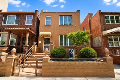 Welcome to this well-maintained two-family brick semi-detached - photo 3