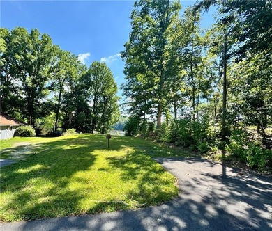 *****LAKEFRONT LOT FOR SALE BROADWAY LAKE - RARE, FLAT LOT with - photo 1