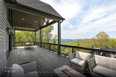 Set within the gated community of Pilots Knob, this thoughtfully - photo 4