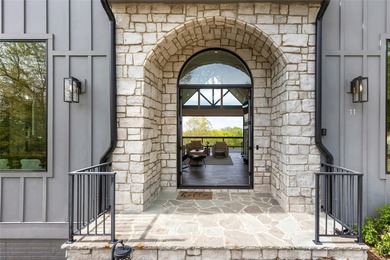 Set within the gated community of Pilots Knob, this thoughtfully - photo 10