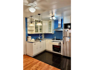 Spacious Two-Bedroom Condominium with Full-Service Amenities in - photo 5