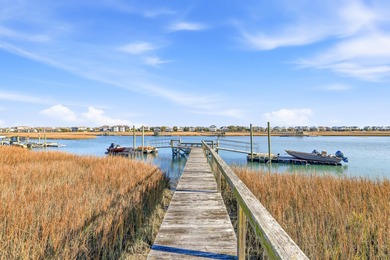 Set along a stunning stretch of marshland, 46 High Hammock Way