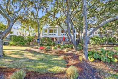 Set along a stunning stretch of marshland, 46 High Hammock Way