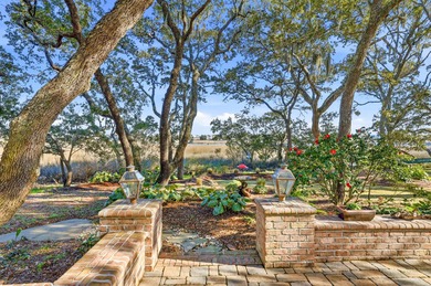 Set along a stunning stretch of marshland, 46 High Hammock Way