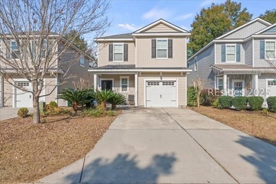 A rare listing in Palmetto Pointe Towns. This home features 4 - photo 1