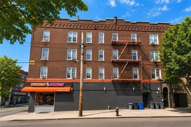 Prime Mixed-Use Corner Investment Opportunity in the Heart of - photo 1