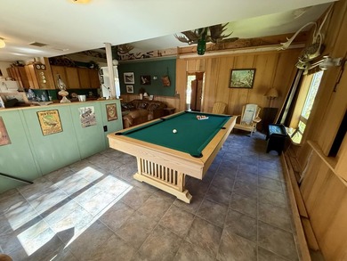 Set your sights on a rare find in the North Maine Woods. Located - photo 12