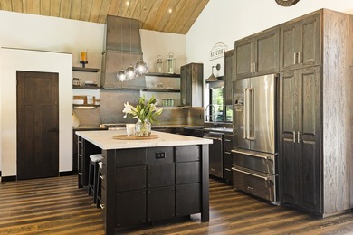 Modern mountain living meets golf course serenity in this - photo 12