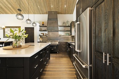 Modern mountain living meets golf course serenity in this - photo 13