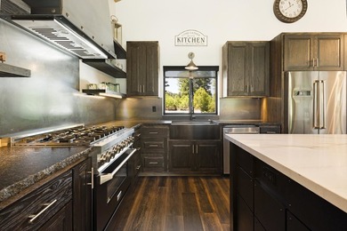 Modern mountain living meets golf course serenity in this - photo 14