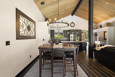 Modern mountain living meets golf course serenity in this - photo 17