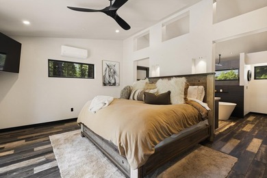 Modern mountain living meets golf course serenity in this - photo 19