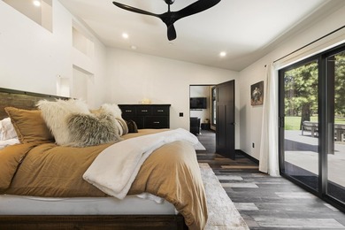 Modern mountain living meets golf course serenity in this - photo 20