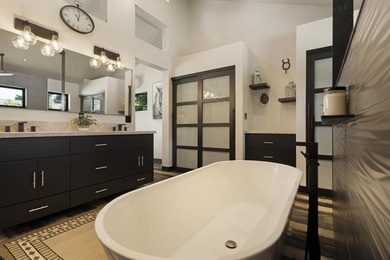 Modern mountain living meets golf course serenity in this - photo 23