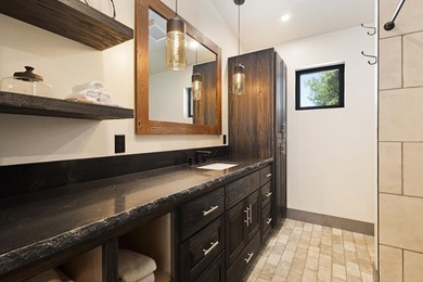 Modern mountain living meets golf course serenity in this - photo 27