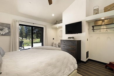 Modern mountain living meets golf course serenity in this - photo 31
