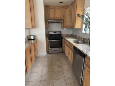 Welcome to this beautifully maintained condominium in the heart - photo 4