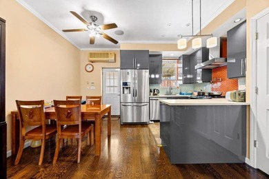 Beautifully renovated brick single-family home with a duplex - photo 8