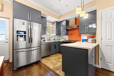 Beautifully renovated brick single-family home with a duplex - photo 9