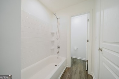 Fresh paint, move-in ready condition, and a low-maintenance - photo 11