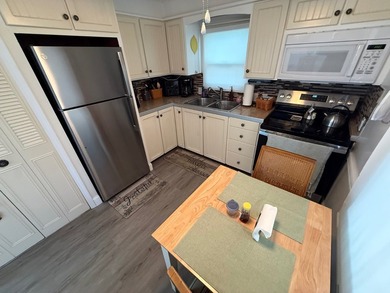 TURNKEY! LOT RENT ONLY 1060 a month, includes water, sewer - photo 11