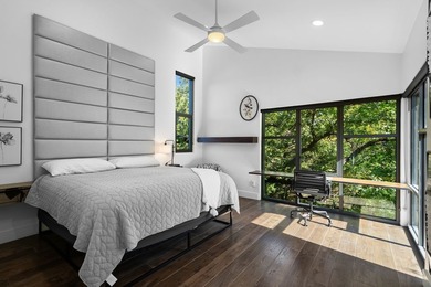 Nestled beneath a canopy of mature trees with sweeping views of - photo 12