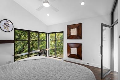 Nestled beneath a canopy of mature trees with sweeping views of - photo 13