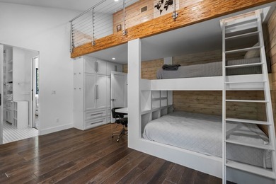 Nestled beneath a canopy of mature trees with sweeping views of - photo 15