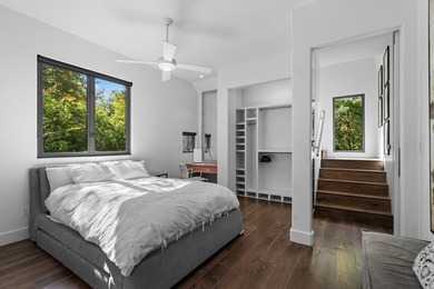 Nestled beneath a canopy of mature trees with sweeping views of - photo 18