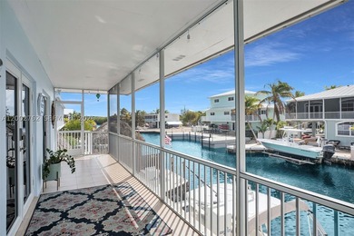 CANAL FRONT - DIRECT OCEAN ACCESS!! Welcome to an experience in - photo 2