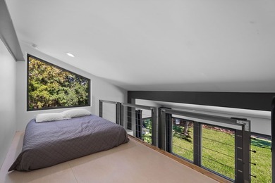 Nestled beneath a canopy of mature trees with sweeping views of - photo 22
