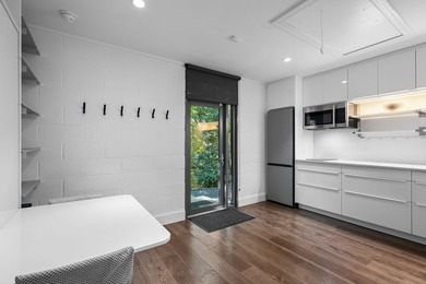 Nestled beneath a canopy of mature trees with sweeping views of - photo 25