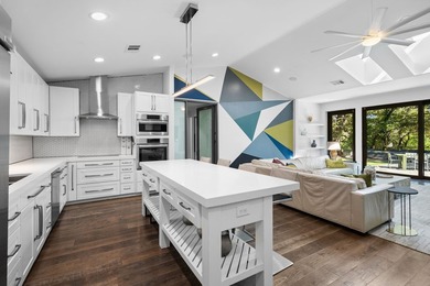 Nestled beneath a canopy of mature trees with sweeping views of - photo 28