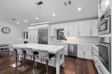 Nestled beneath a canopy of mature trees with sweeping views of - photo 29