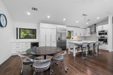 Nestled beneath a canopy of mature trees with sweeping views of - photo 31