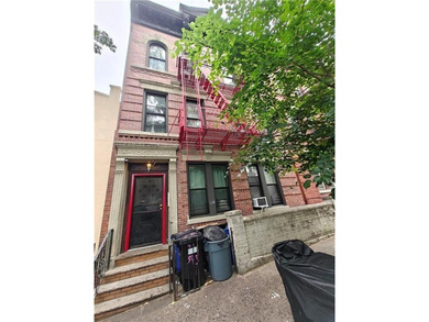 Welcome to this 6-family brick house located in Sunset Park. The - photo 3