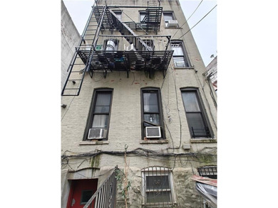 Welcome to this 6-family brick house located in Sunset Park. The - photo 4