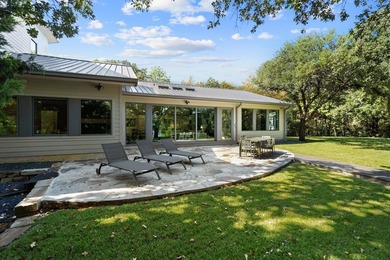 Nestled beneath a canopy of mature trees with sweeping views of - photo 35