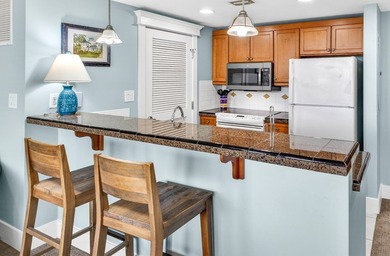 Discover relaxed coastal living in this beautifully furnished - photo 8
