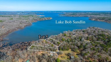 Escape to the serene beauty of Lake Bob Sandlin with this - Lake Lot For Sale in Scroggins, Texas