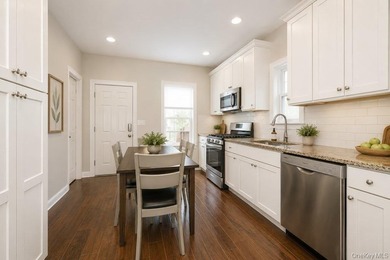 Strong and sturdy detached brick 2-family home in the heart of - photo 3