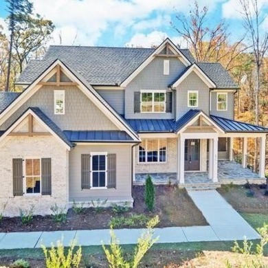 Lake Home For Sale in Flowery Branch, Georgia