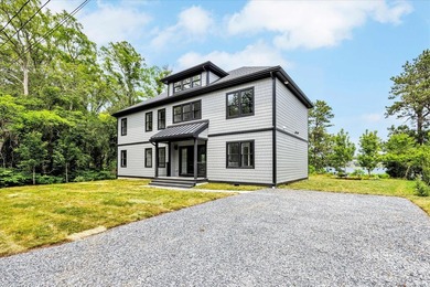 Stunning New Waterfront Construction with Sweeping Water Views - photo 1