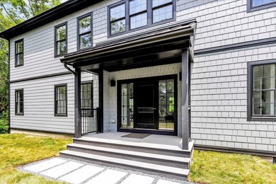 Stunning New Waterfront Construction with Sweeping Water Views - photo 9