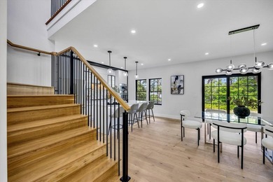 Stunning New Waterfront Construction with Sweeping Water Views - photo 10