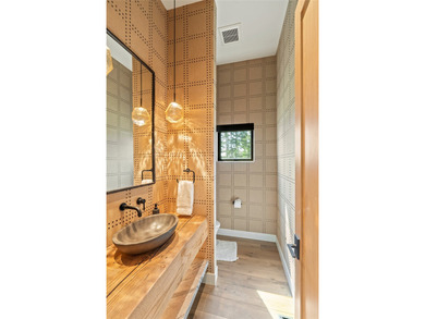 Peak Lakeside Luxury! Built by Malmquist Construction, this - photo 15