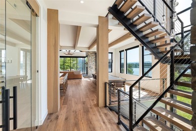 Peak Lakeside Luxury! Built by Malmquist Construction, this - photo 16