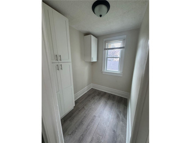 Located in the Maplewood Historic District! Add this duplex to - photo 17