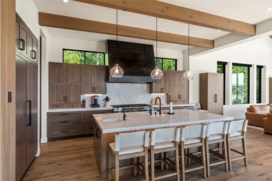 Peak Lakeside Luxury! Built by Malmquist Construction, this - photo 23